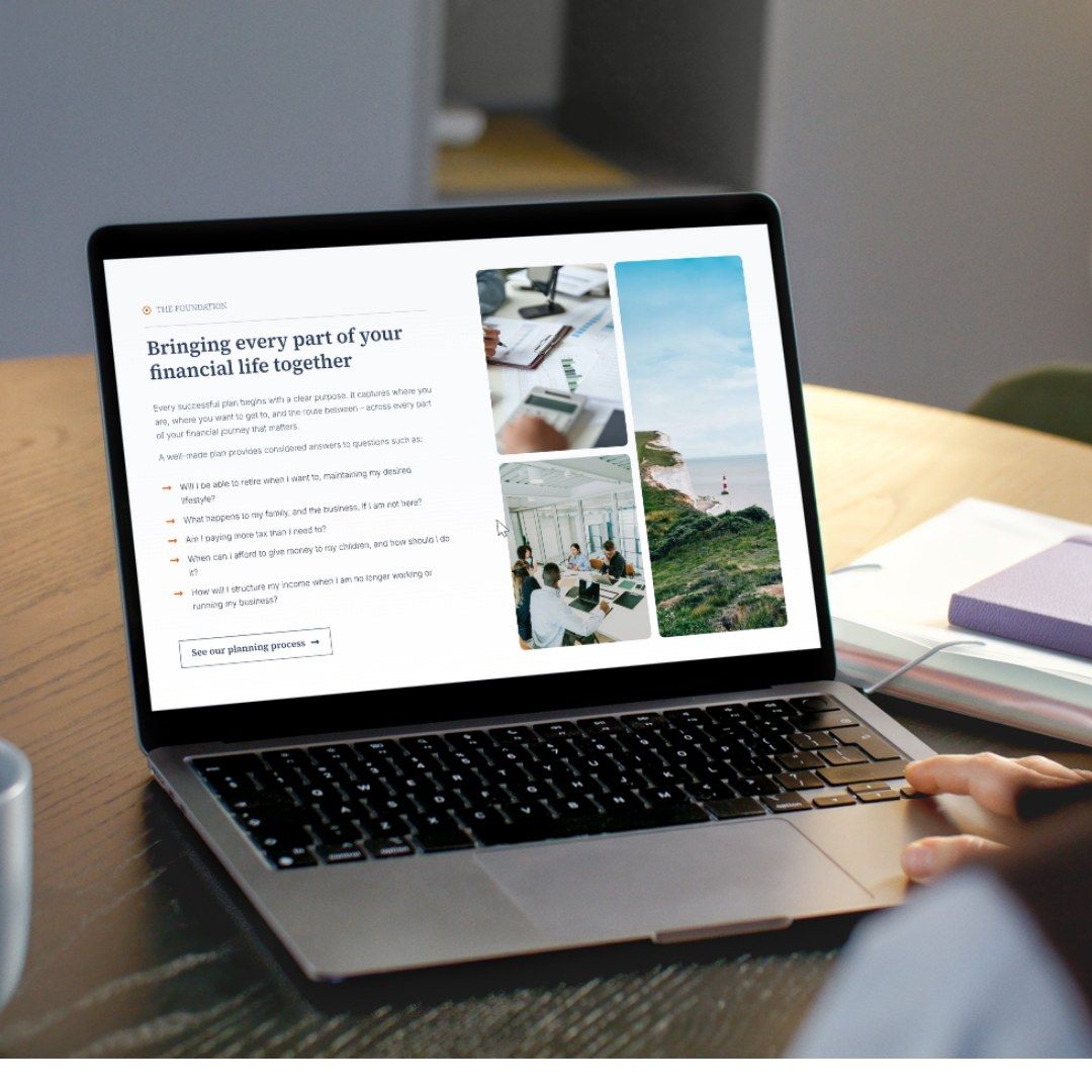 The Global WealthMAP website on a laptop