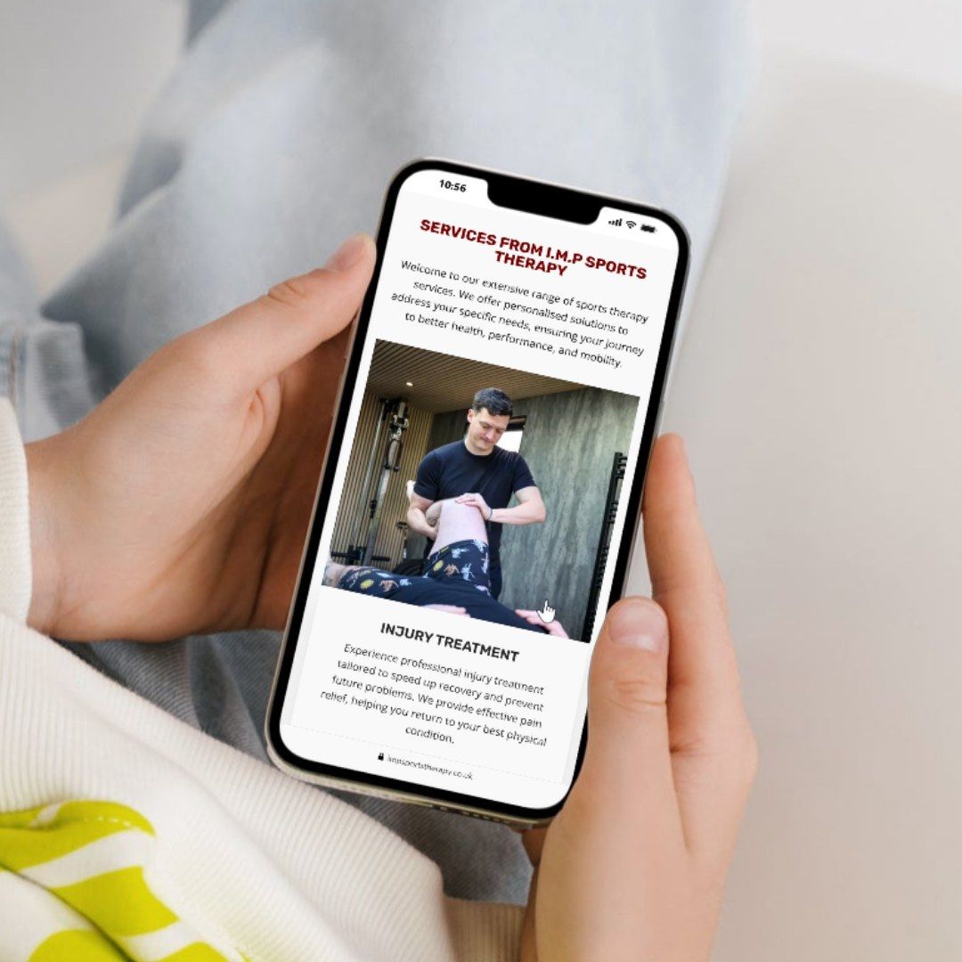 The IMP Sports Therapy website on a phone