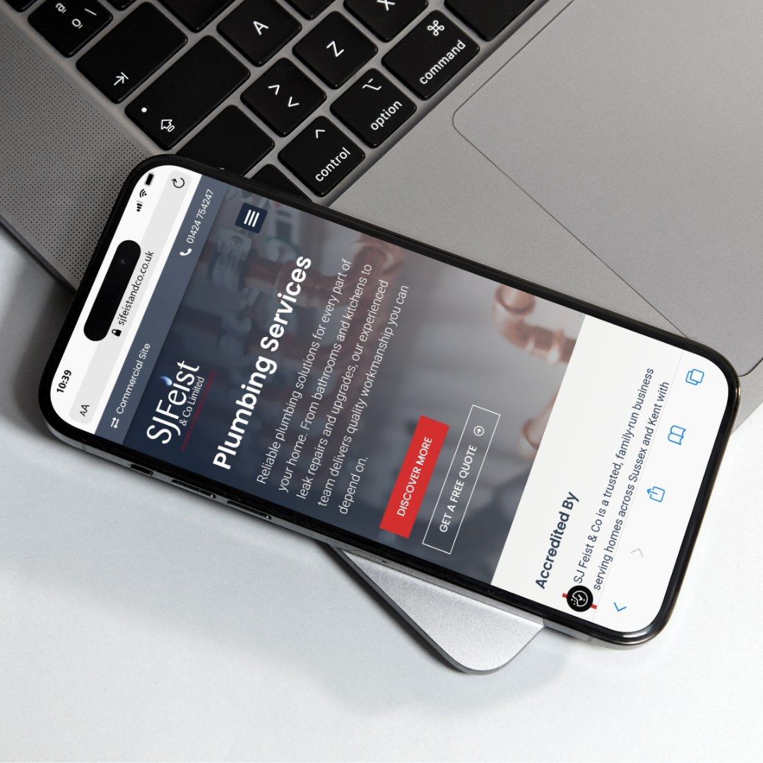 The SJ Feist & Co website on a phone